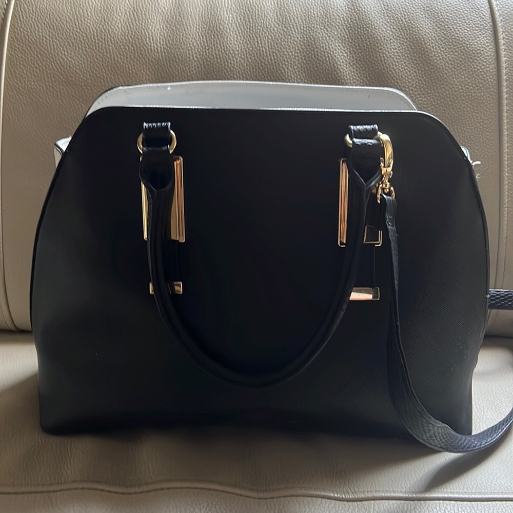 Mossimo from Target Black handbag with white sides and gold details.